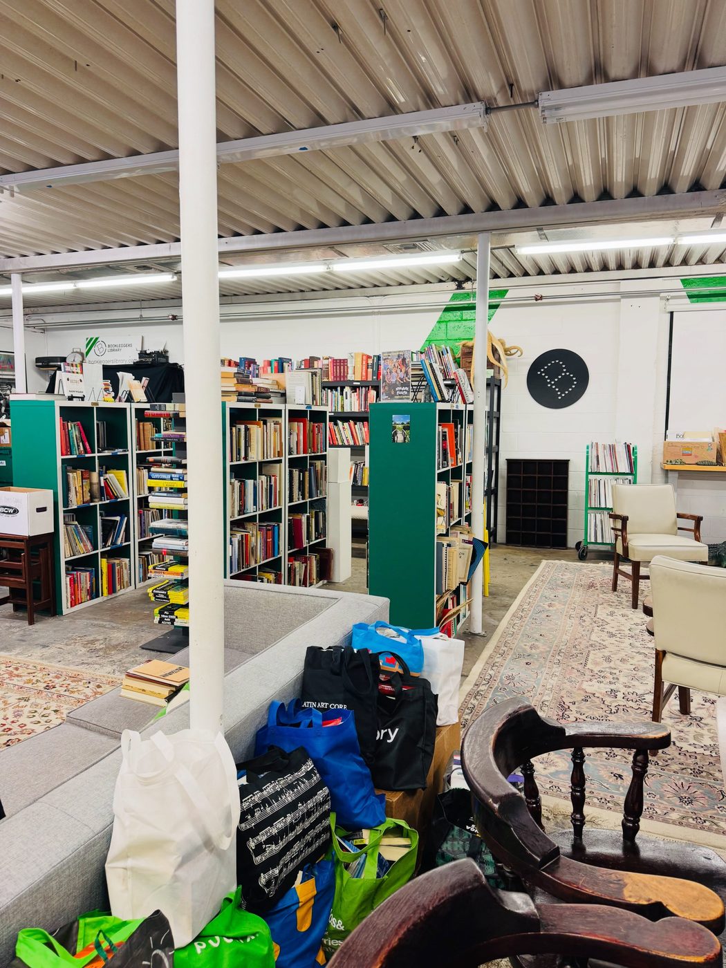 Bags of donated books inside the Bookleggers free bookstore